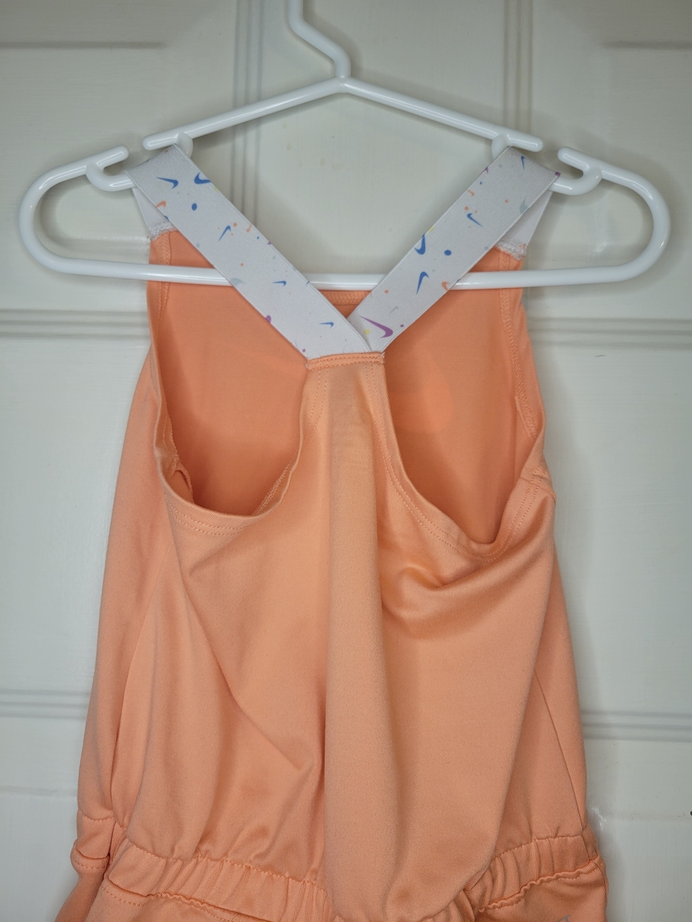 Nike Peach Dri-Fit Girls' Athletic Romper with Printed Swoosh - Picture 9 of 9